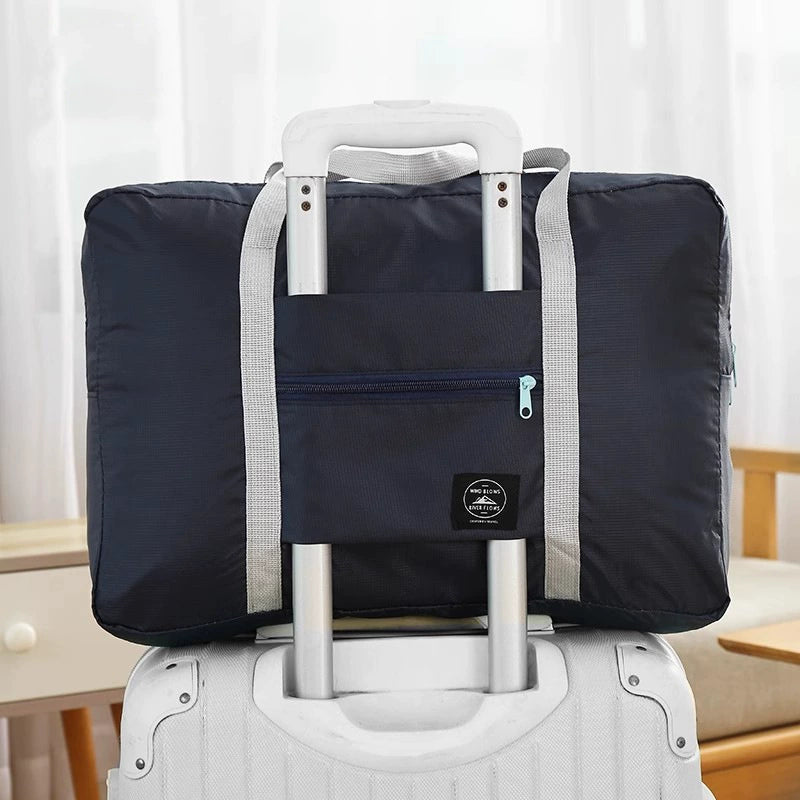 BOLSA DE VIAJE PEGABLE DE MALETA
